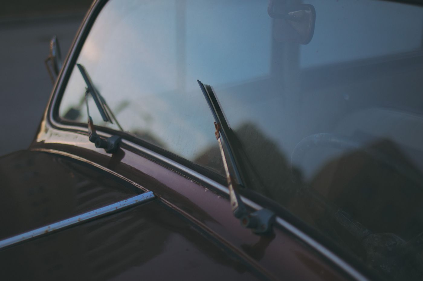 Close view of a vehicle windshield and wipers